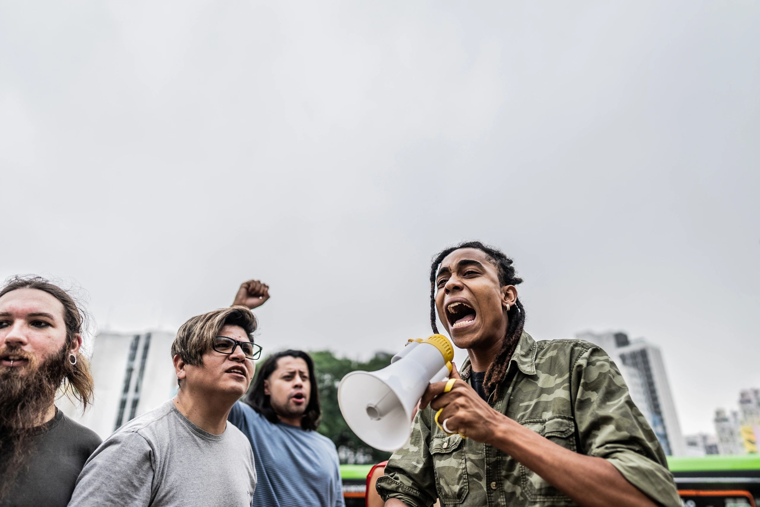 Speaker using a megaphone during a street action